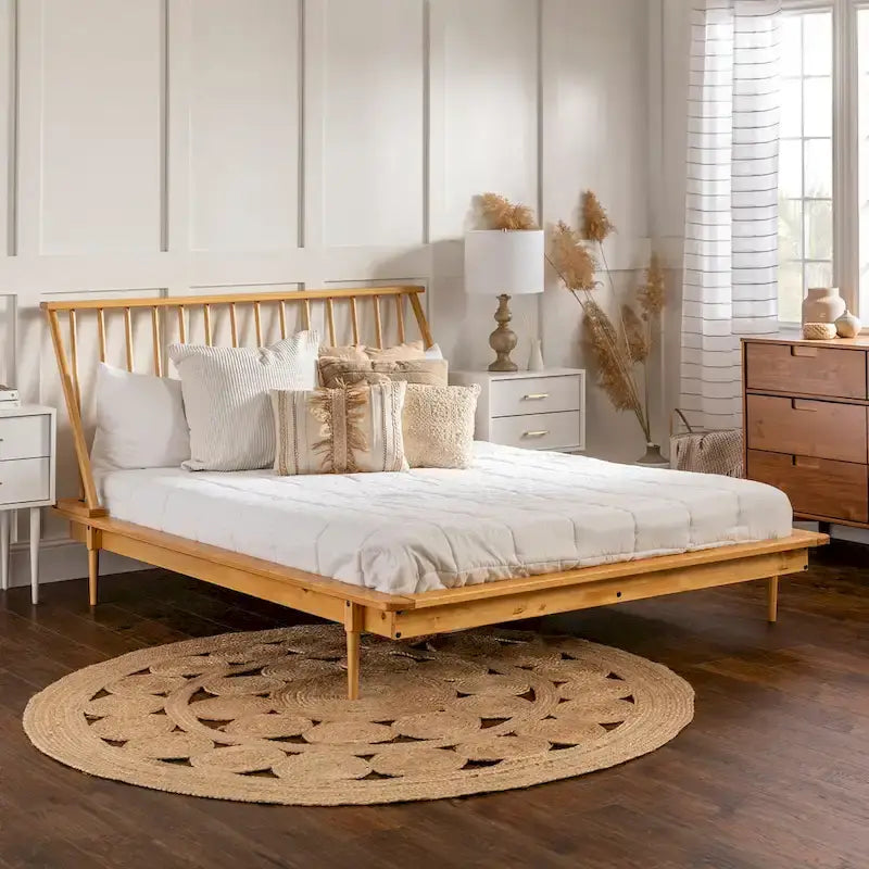 Letto a piattaforma con montanti in legno massello