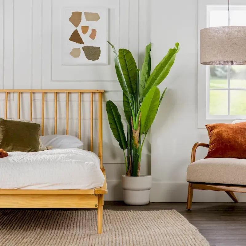 Letto a piattaforma con montanti in legno massello