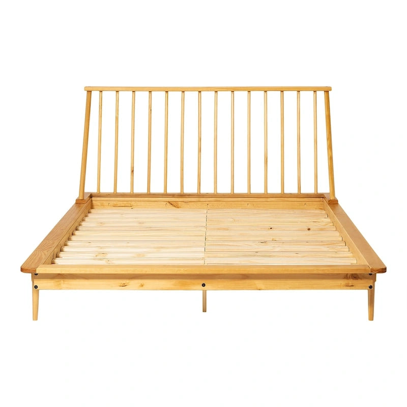 Letto a piattaforma con montanti in legno massello