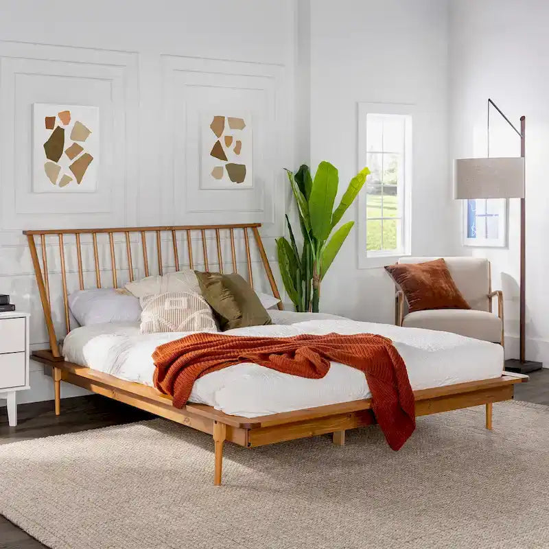 Letto a piattaforma con montanti in legno massello